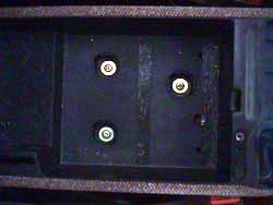 Screws inside utility tray