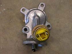 Oil filter bracket & pressure sender unit