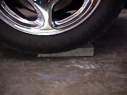 2 x 4 under front tire